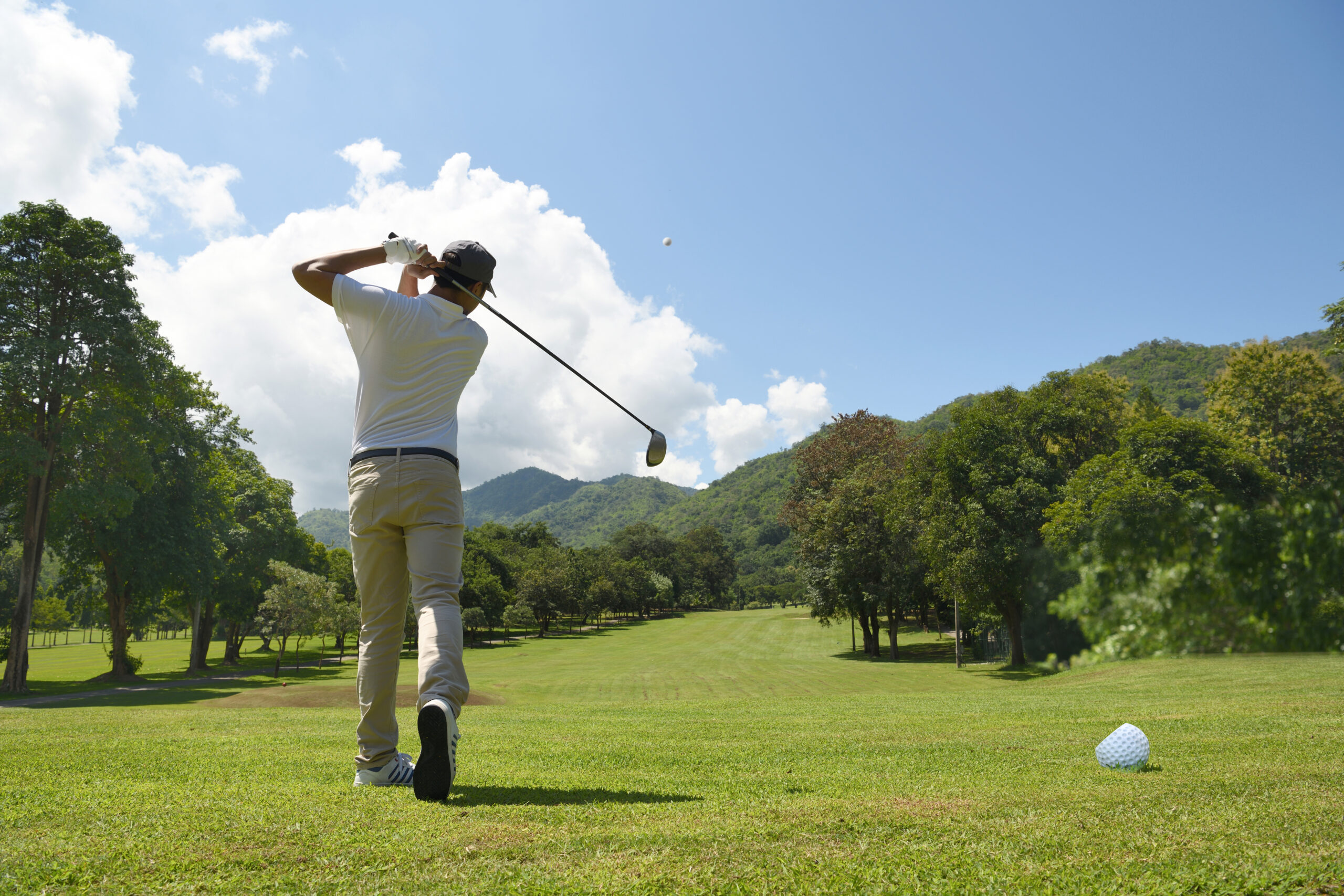 Golfer swinging 1 scaled